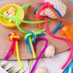 4223-12 *Paquete c/12 Cuerdas Elásticas Fosforescentes* (28 cm.) - Imagen 3