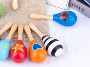 3202 *CHICA Maracas de Madera* (5x13 cm.) 12 Diferentes.