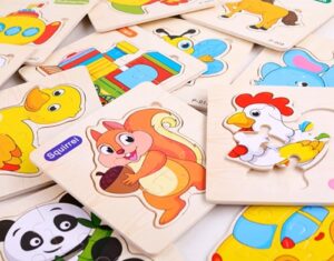 1334 *ROMPECABEZAS d/Madera POCAS PIEZAS* (15x15 cm.)  27 Diferentes.